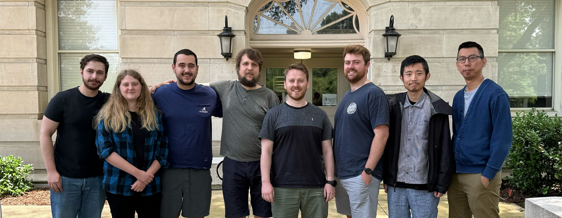 a group of people in front of Gallalee Hall